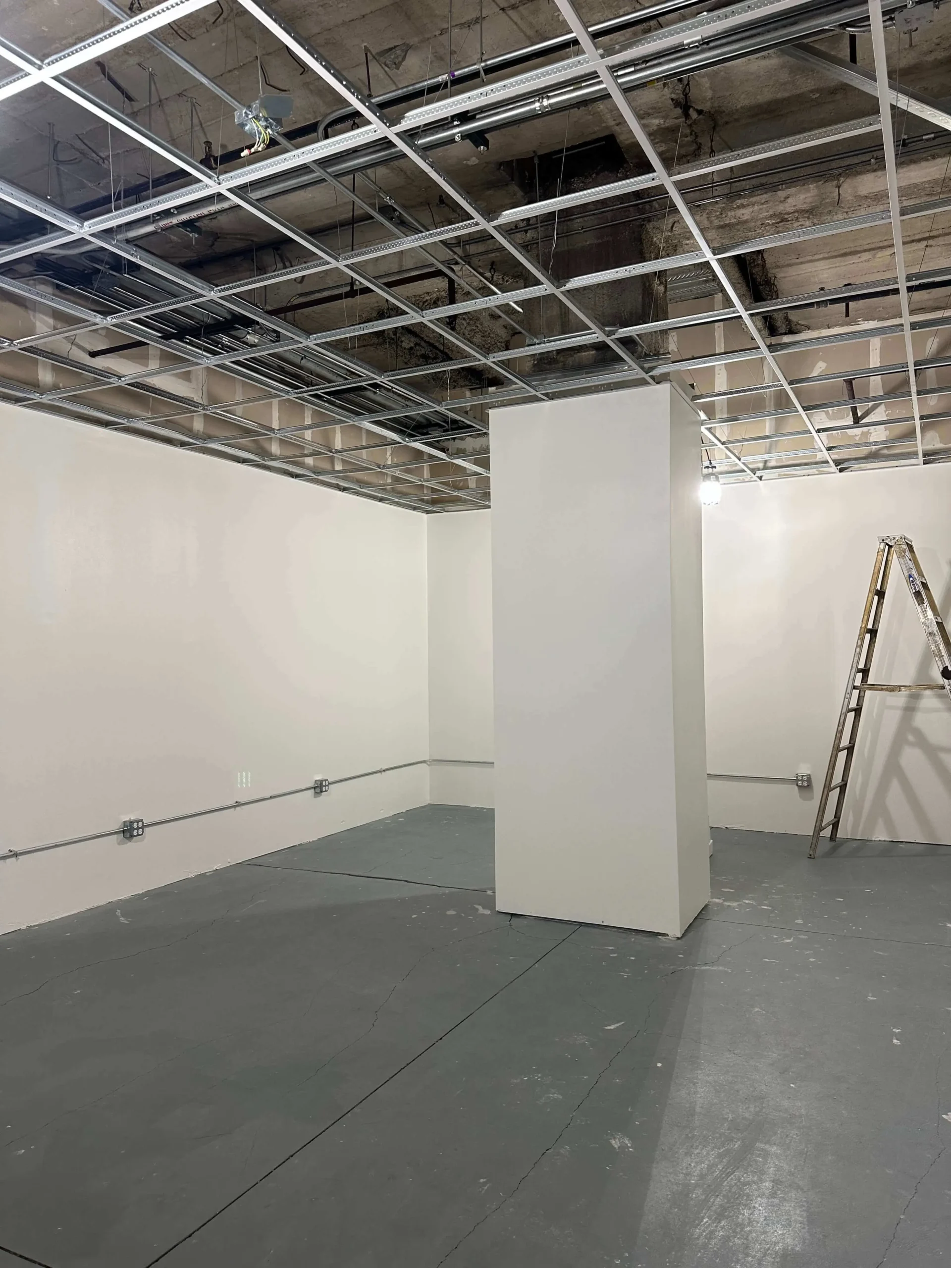 Interior painting project with newly finished walls and trim.